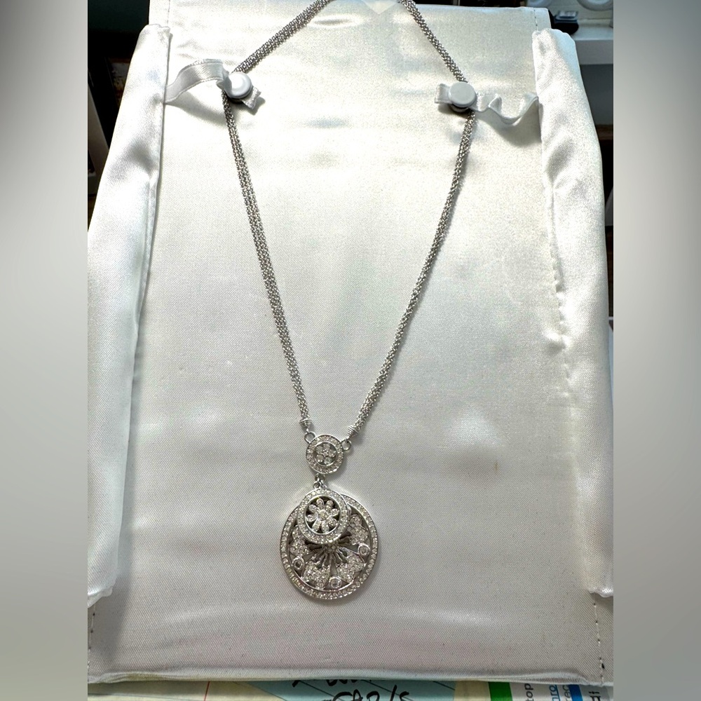 Silver and rhinestone three pendant necklace.